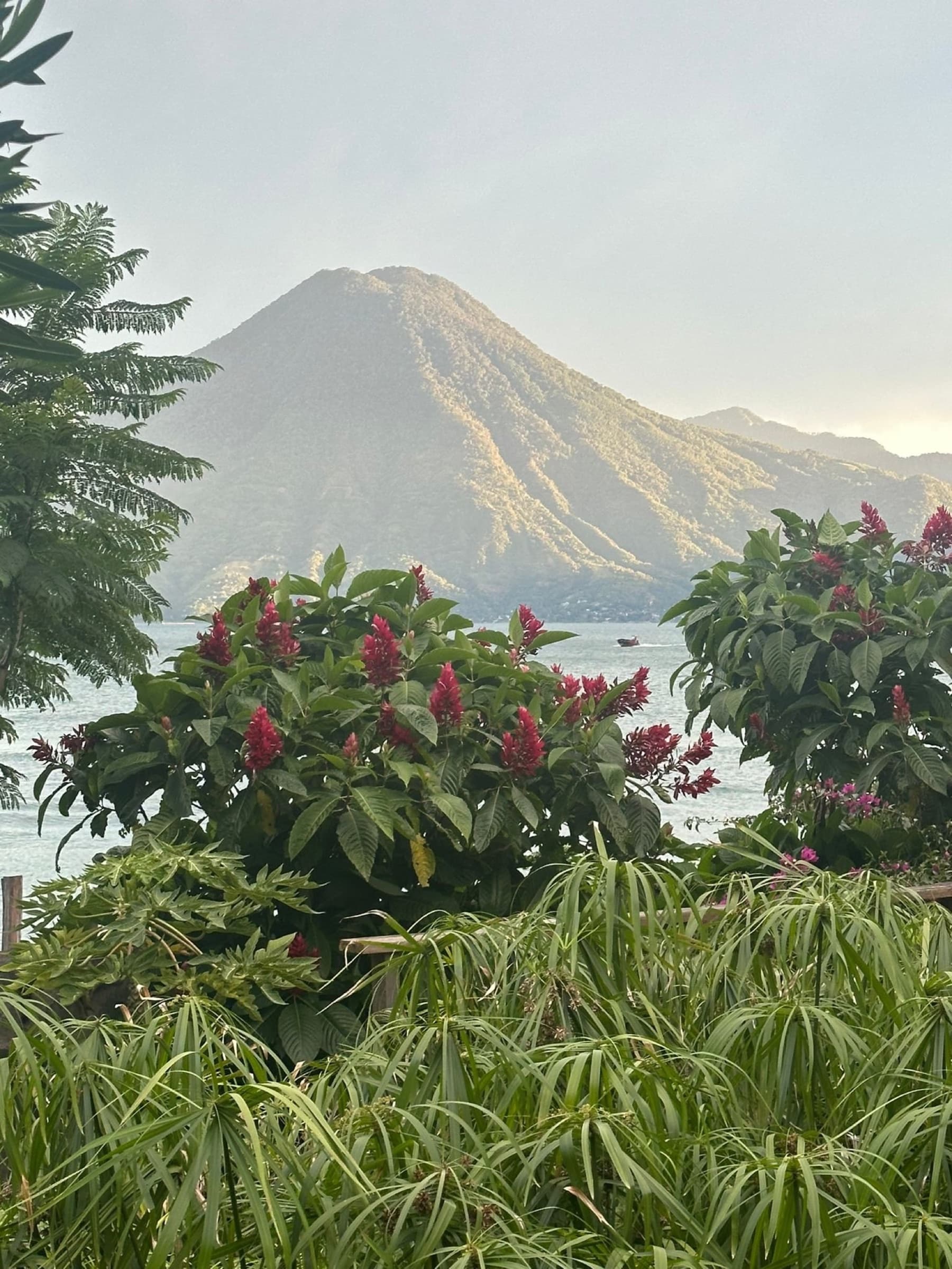 A guest taking in the lake view from a Villas del Carmen terrace